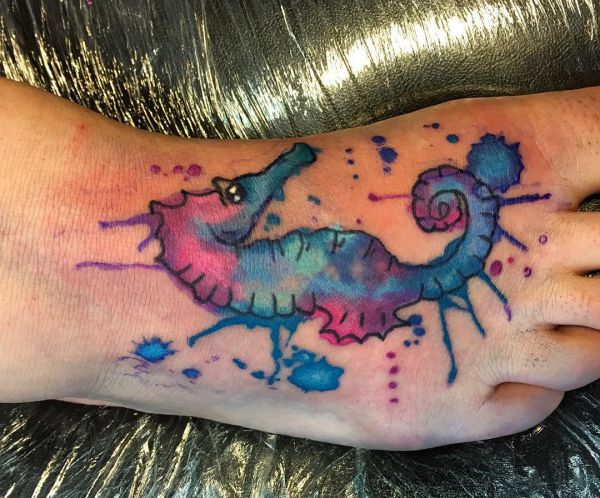 21 seahorse tattoos - as a tattoo the animal stands for endurance