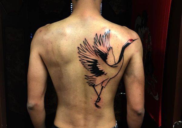 19 stunning crane tattoos and their meanings