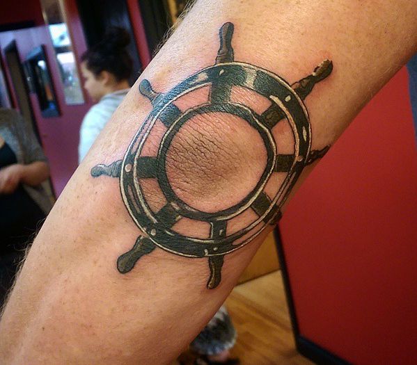 Ship Wheel Tattoos Designs and Meanings