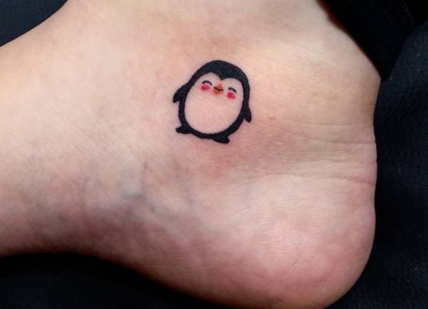 Penguin Tattoo - 22 cute concepts with which means