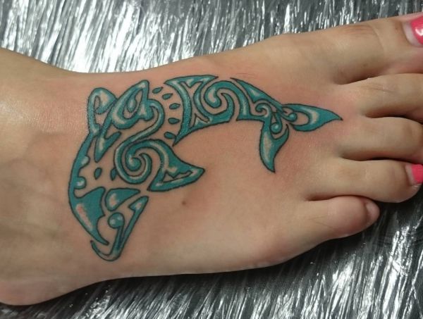 Dolphin tattoos and the meanings