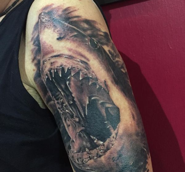 12 Implausible shark tattoos and their meanings