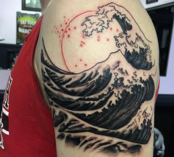 Water and waves tattoos: meanings and designs