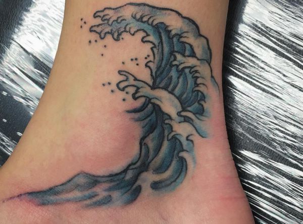 Water and waves tattoos: meanings and designs