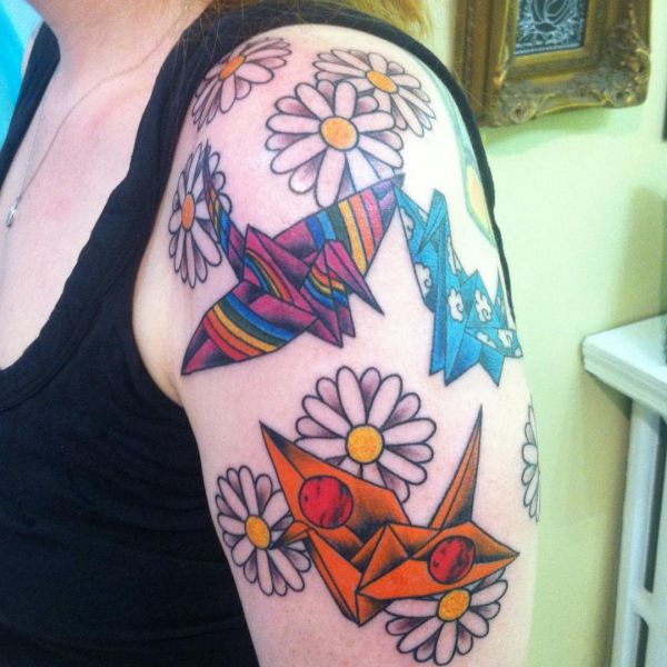 33 stunning daisy tattoos and their meanings