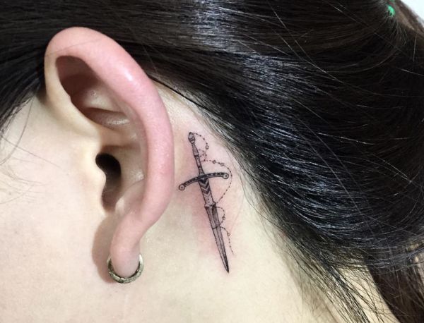 20 sword tattoo motifs and their symbolic which means