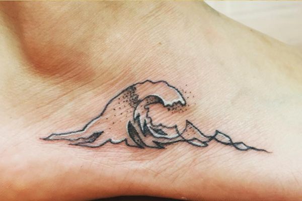 Water and waves tattoos: meanings and designs