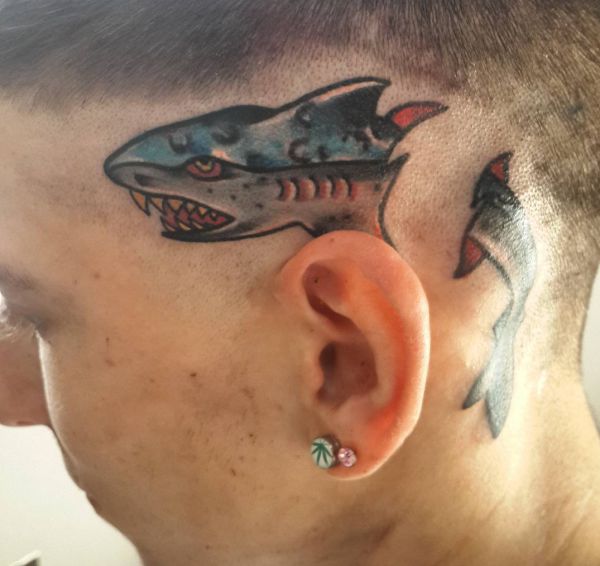 12 Implausible shark tattoos and their meanings