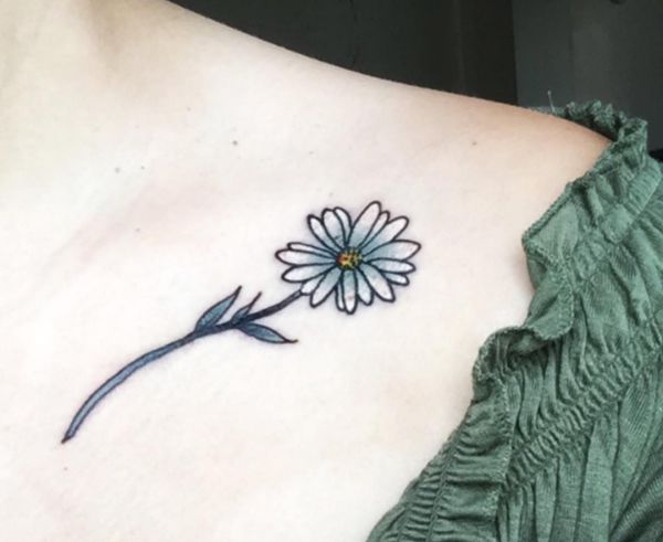 33 stunning daisy tattoos and their meanings