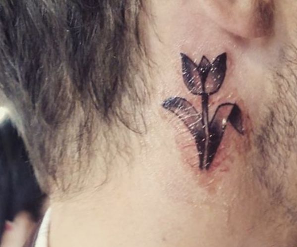 24 stunning tulip tattoos and their meanings