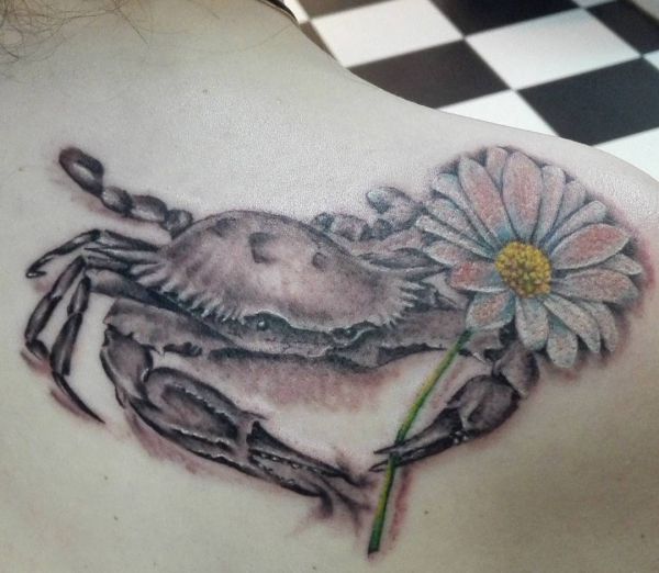 33 stunning daisy tattoos and their meanings