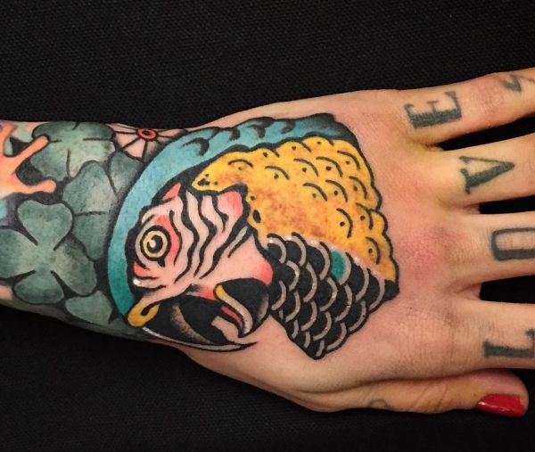 16 attractive parrot tattoos and their meanings