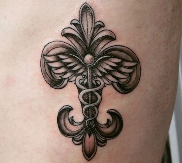 12 French Fleur de Lis (fleur-de-lis) tattoos & its that means
