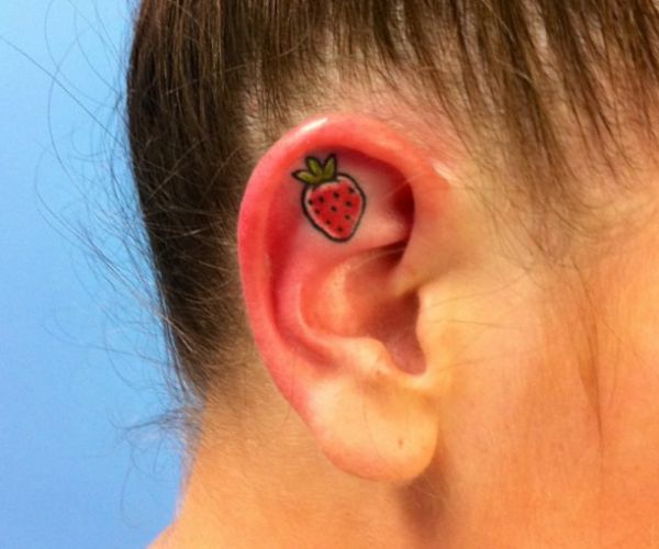 15 lovely strawberry tattoos and their meanings