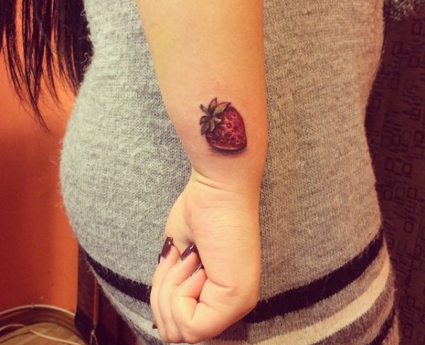 15 lovely strawberry tattoos and their meanings