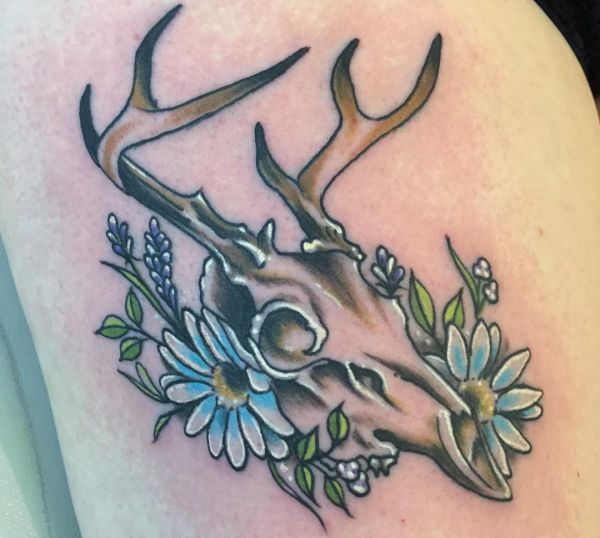 33 stunning daisy tattoos and their meanings