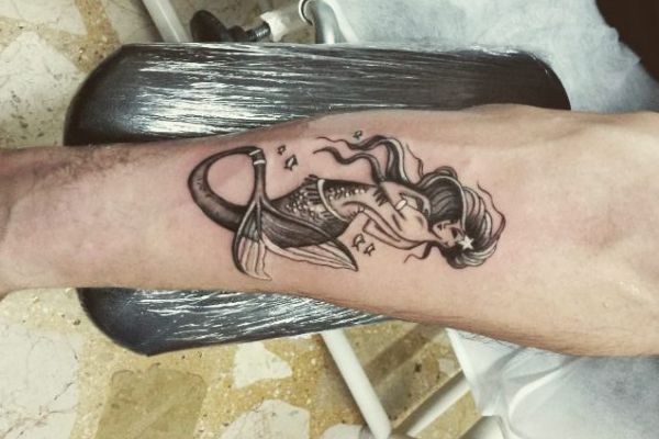 Mermaid tattoo meanings and constructions