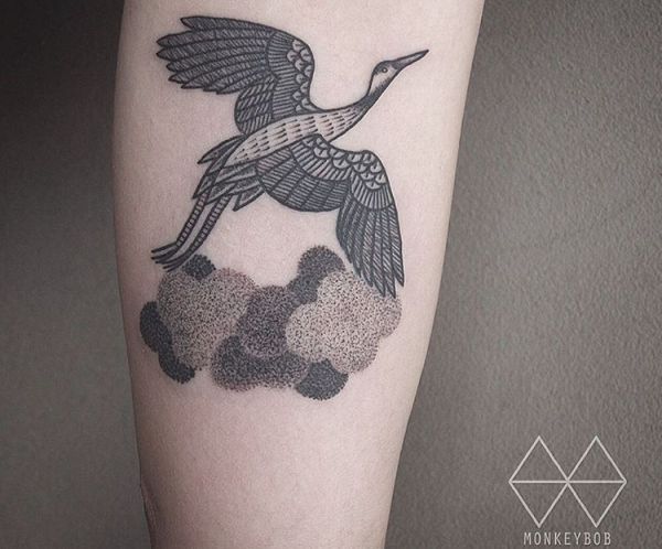 19 stunning crane tattoos and their meanings