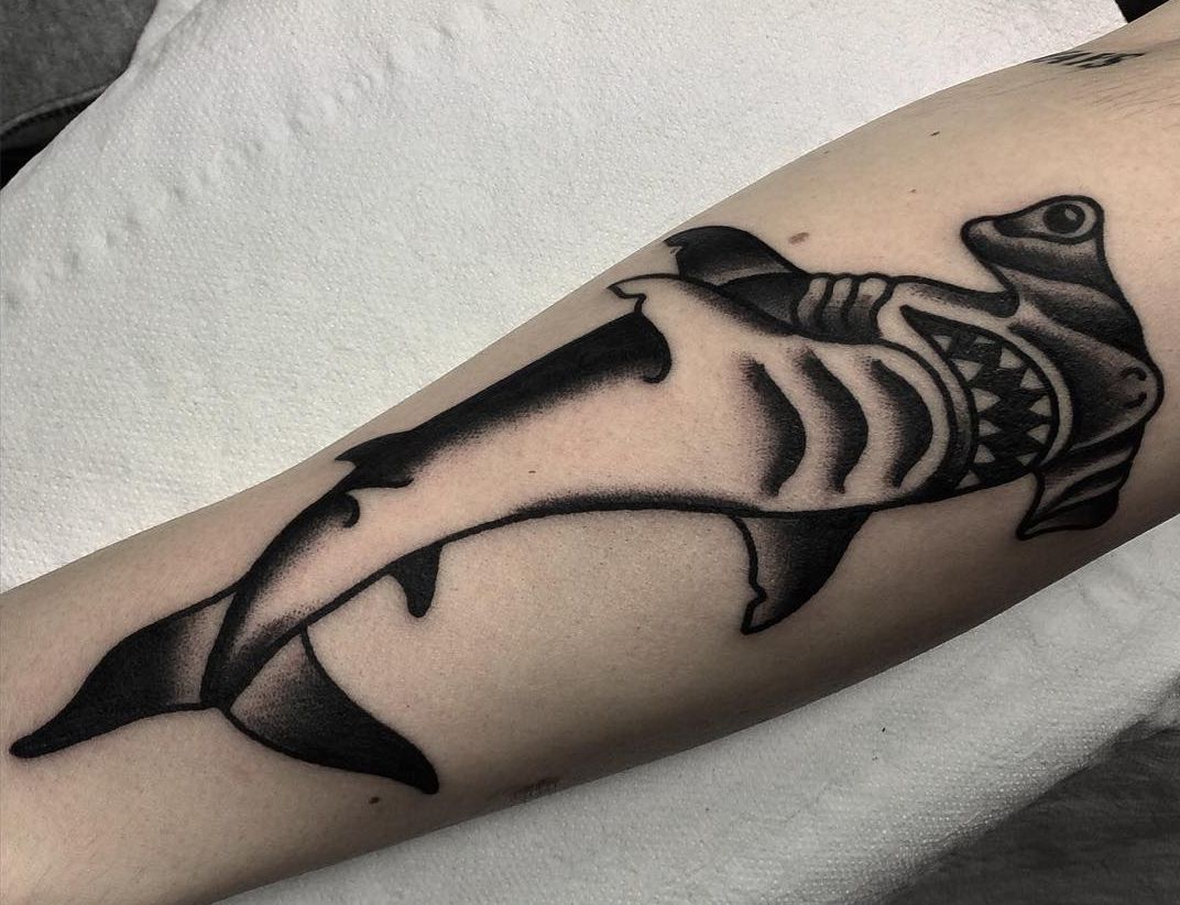 12 Implausible shark tattoos and their meanings