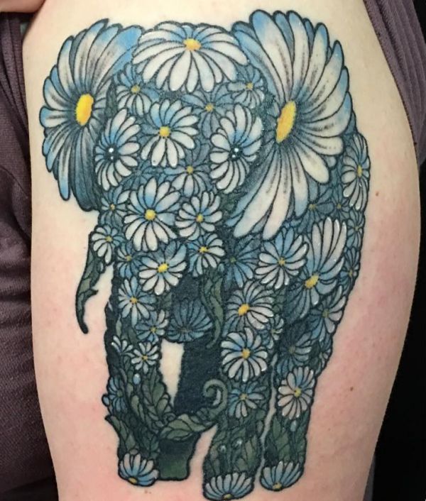 33 stunning daisy tattoos and their meanings