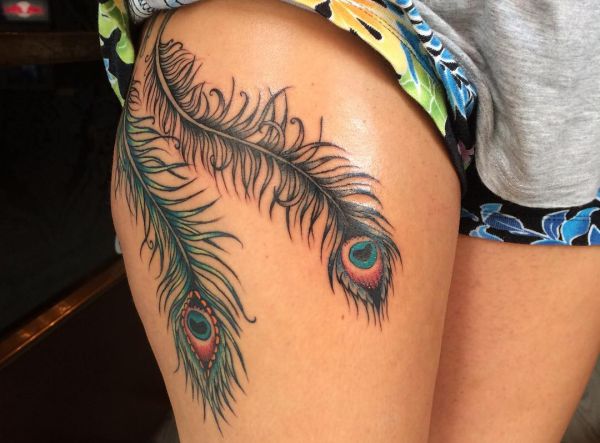 Feather Tattoos: Designs, Concepts and Meanings