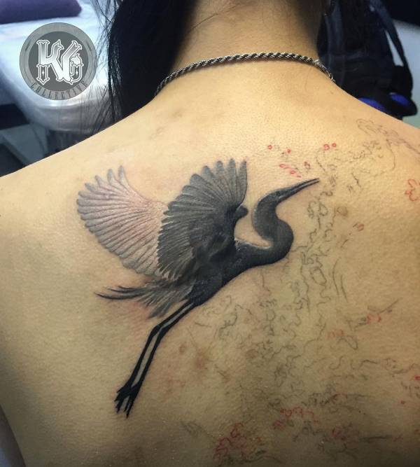 19 stunning crane tattoos and their meanings