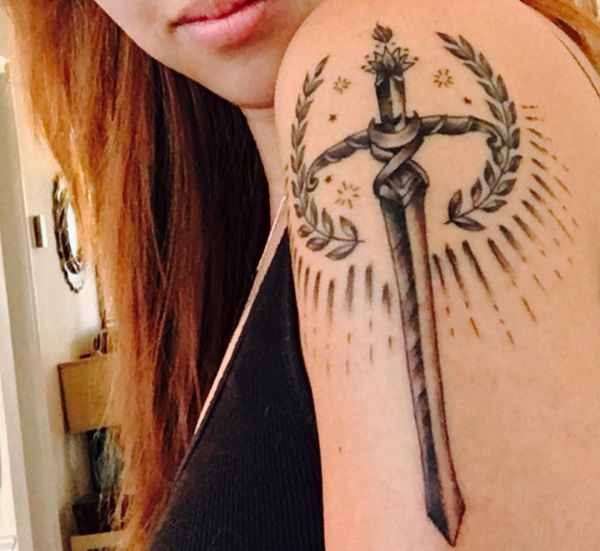 20 sword tattoo motifs and their symbolic which means