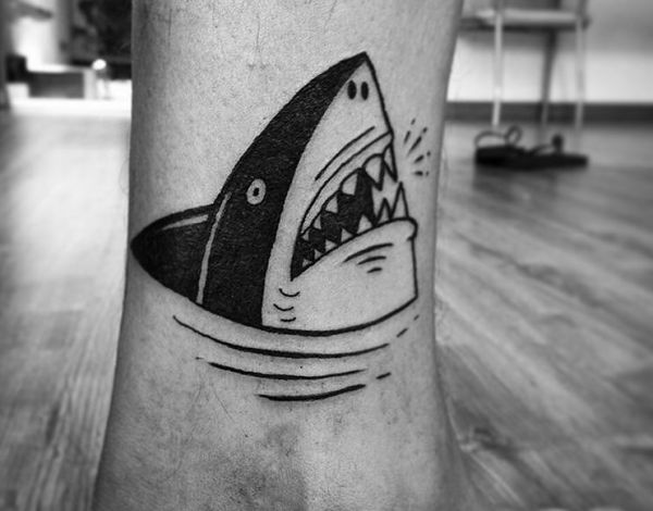 12 Implausible shark tattoos and their meanings