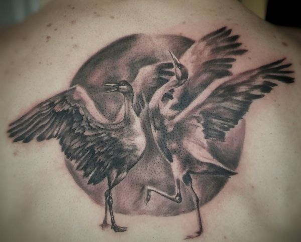 19 stunning crane tattoos and their meanings