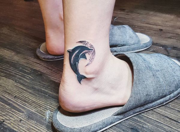 Dolphin tattoos and the meanings