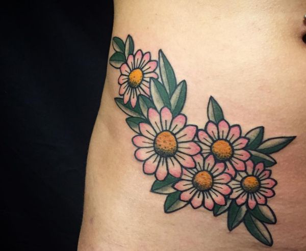 33 stunning daisy tattoos and their meanings