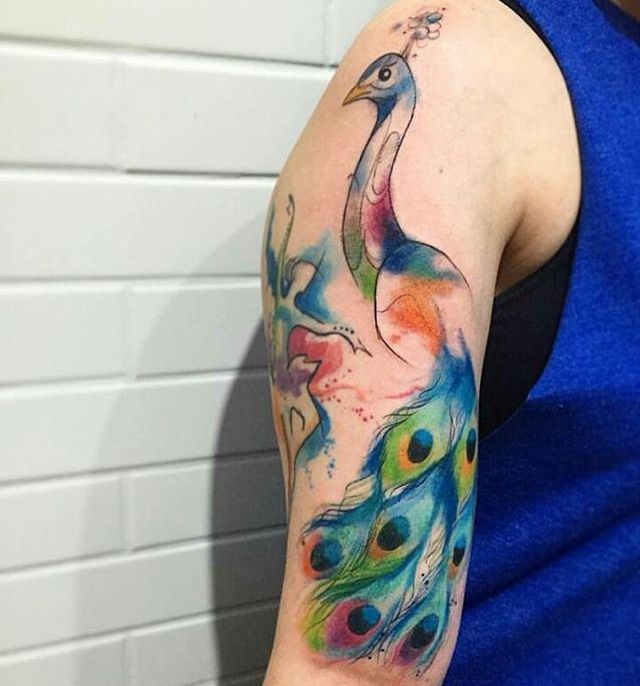 21 very stunning peacock tattoos - as a logo of magnificence