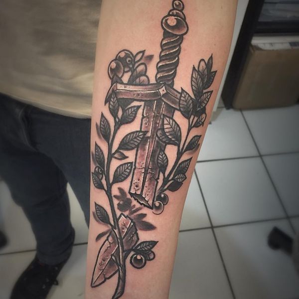 20 sword tattoo motifs and their symbolic which means