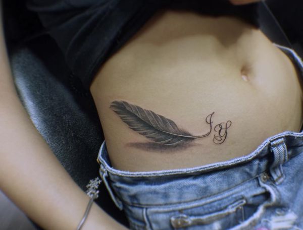 Feather Tattoos: Designs, Concepts and Meanings