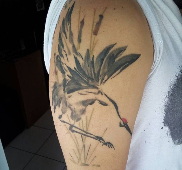 19 stunning crane tattoos and their meanings