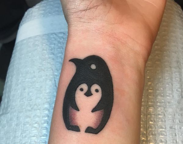 Penguin Tattoo - 22 cute concepts with which means