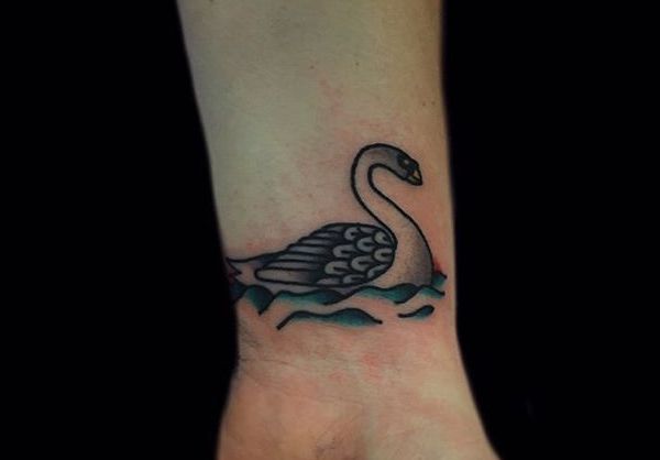 18 stunning swan tattoos and their that means