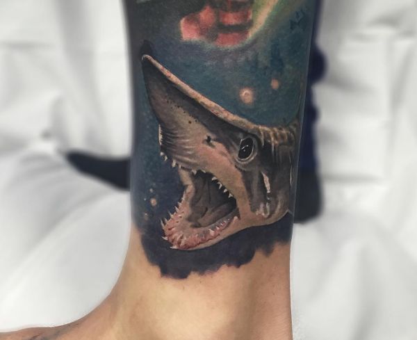 12 Implausible shark tattoos and their meanings