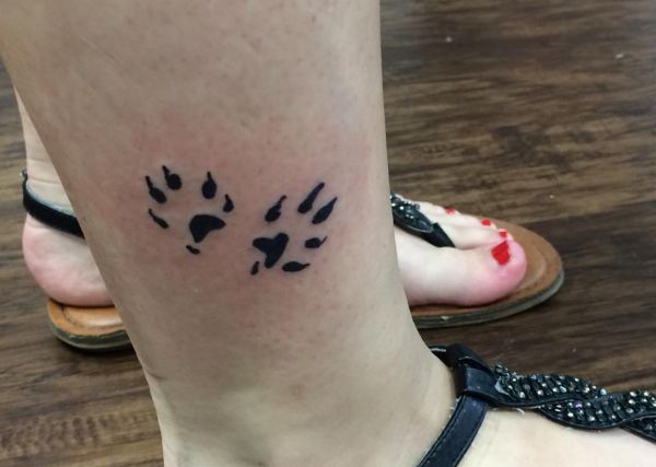 33 paws tattoo concepts - photos and that means