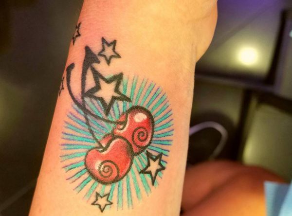 Cherry Tattoo-som betyr motivene og funky designene