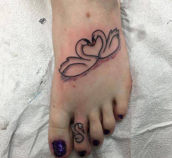 18 stunning swan tattoos and their that means