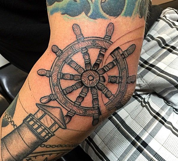 Ship Wheel Tattoos Designs and Meanings