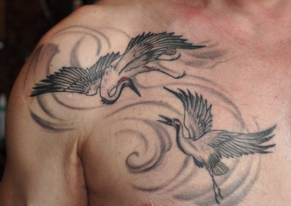 19 stunning crane tattoos and their meanings