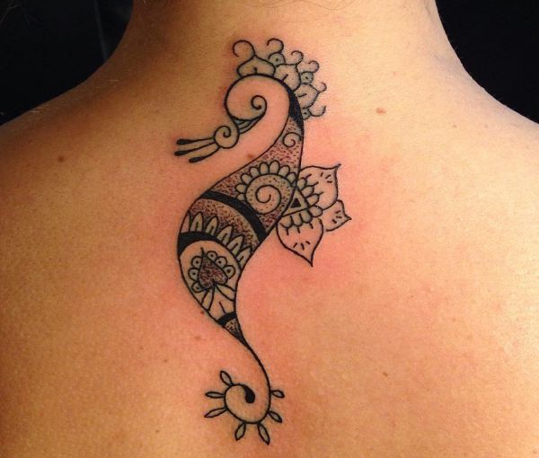 21 seahorse tattoos - as a tattoo the animal stands for endurance