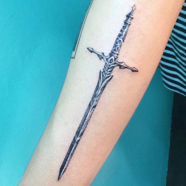 20 sword tattoo motifs and their symbolic which means