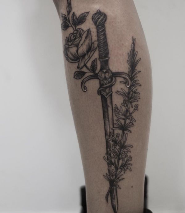 20 sword tattoo motifs and their symbolic which means