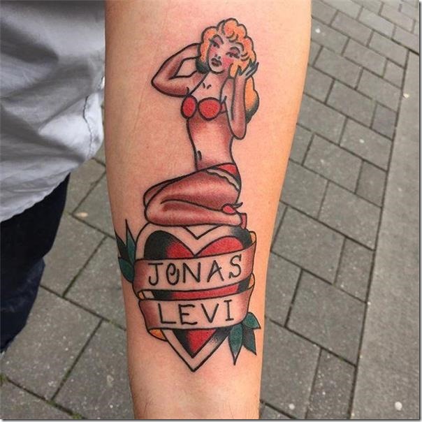 A Pin-ups Tattoos filled with perspective and elegance on the arm