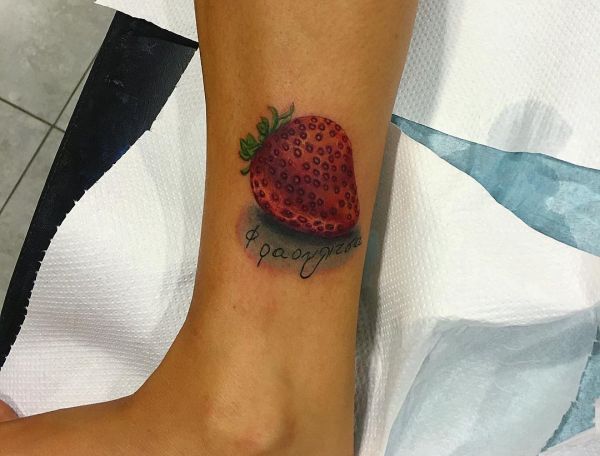 15 lovely strawberry tattoos and their meanings