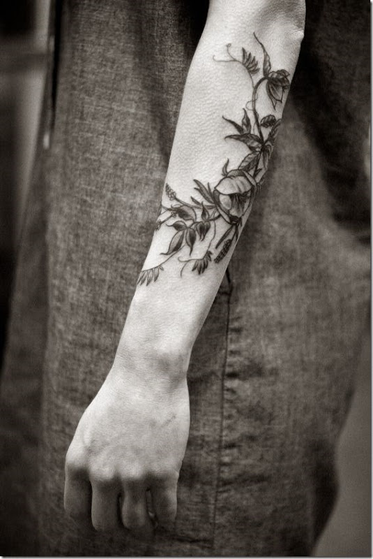 Lovely Exterior Of The Forearm Tattoos