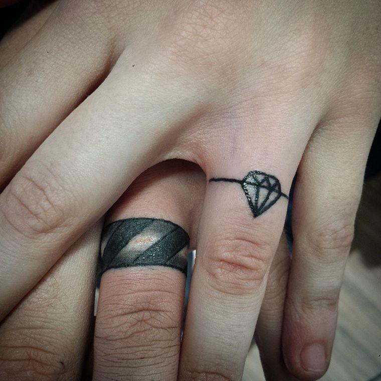 Tattoo finger lady and man who exchange the alliance for all times